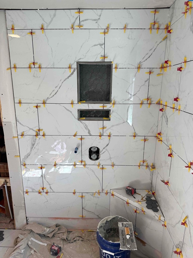 Inman SC bathroom remodel project with intricate tile designs.